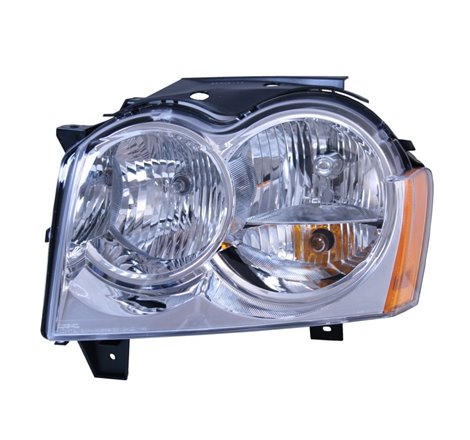 Omix Left Headlight Assembly 05-10 Grand Cherokee (WK)