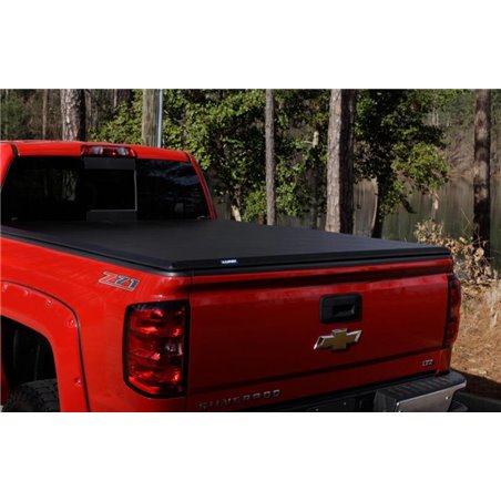 Lund 05-15 Toyota Tacoma Fleetside (5ft. Bed) Hard Fold Tonneau Cover - Black