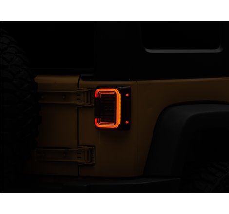 Raxiom 07-18 Jeep Wrangler JK Axial Series LED Halo Tail Lights- Black Housing (Dark Smoked Lens)