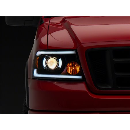 Raxiom 04-08 Ford F-150 Axial Series Projector Headlights w/ SEQL LED Bar- Blk Housing (Clear Lens)