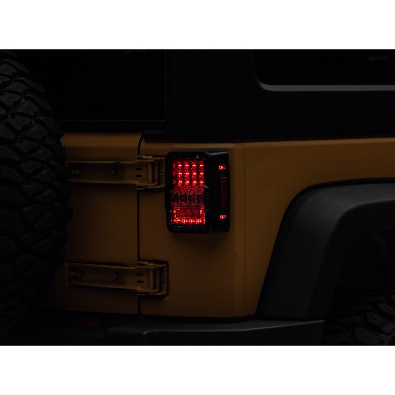 Raxiom 07-18 Jeep Wrangler JK Axial Series Lux LED Tail Lights- Blk Housing (Clear Lens)